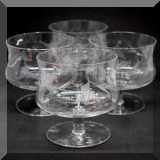 G53. Set of 4 glasses with cut leaf design.  